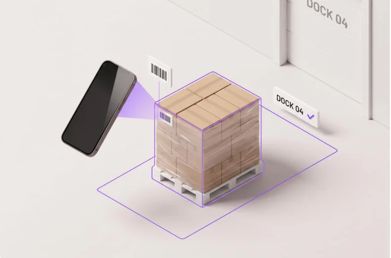 A phone reads the label on a wrapped pallet staged inside an outlined footprint in front of the Dock 04 door, with a confirmed dock tag beside it.